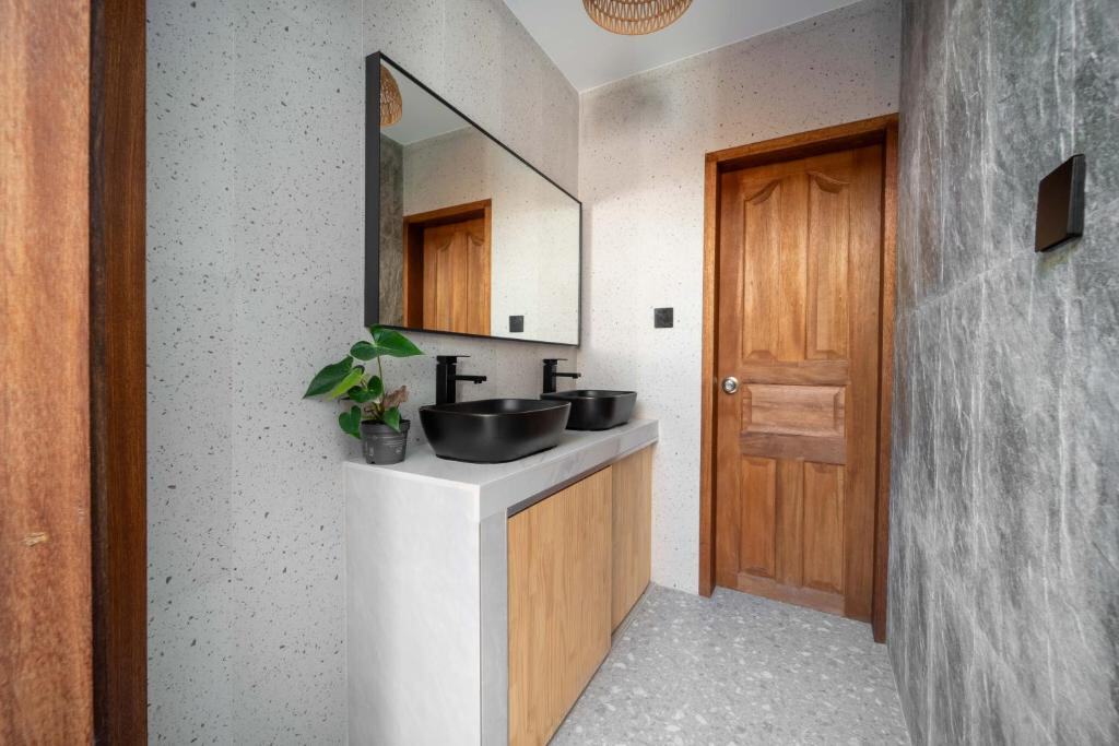 Twin washbasins in the private bathroom